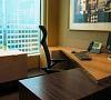 This modern custom desk was designed by Cb Miles for a prominent Atlanta cosmetic dentist. Cb is renowned for making small spaces more efficient.